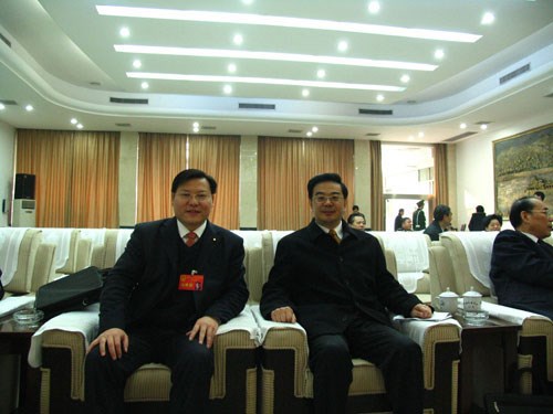 王董與最高人民法院院長、原湖南省省長周強在一起